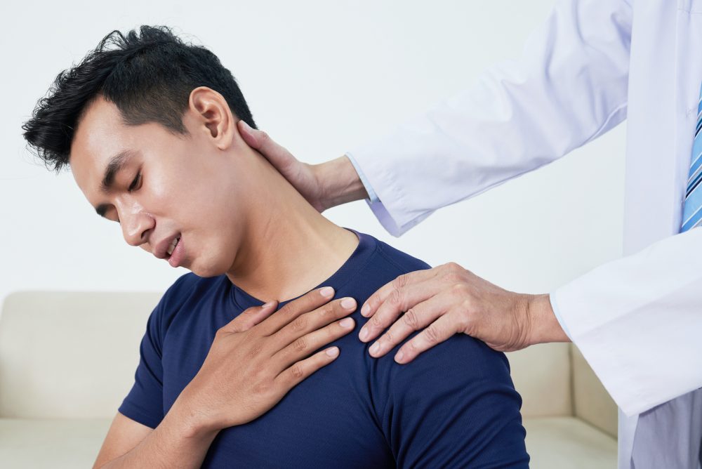 Patient suffering from neck pain